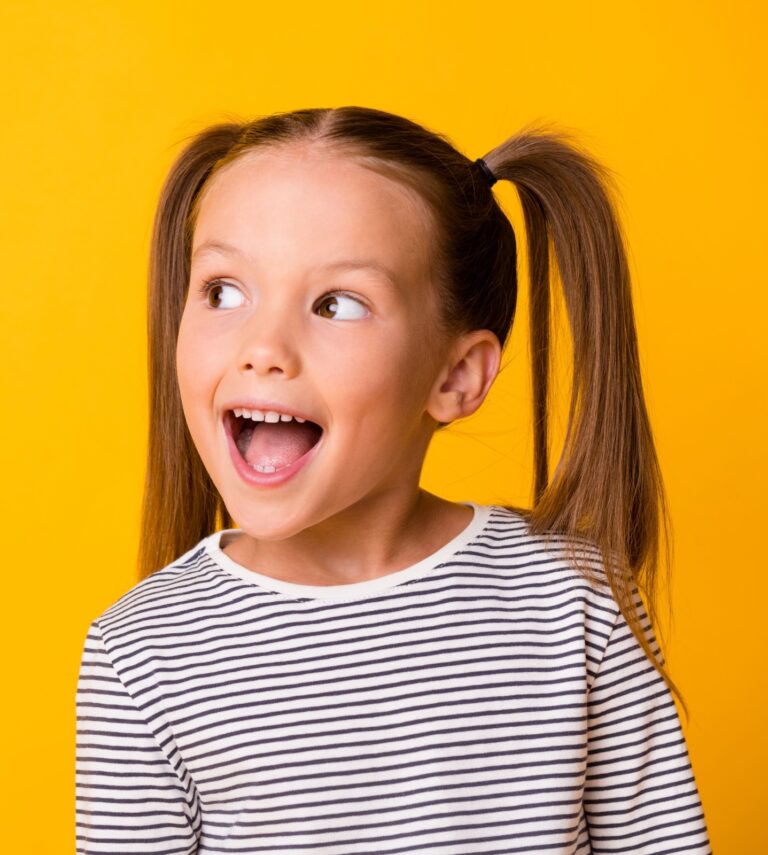 Exterior of Gateway Little Smiles pediatric dental office in Greater St. Louis with covered entrance and brick facade.